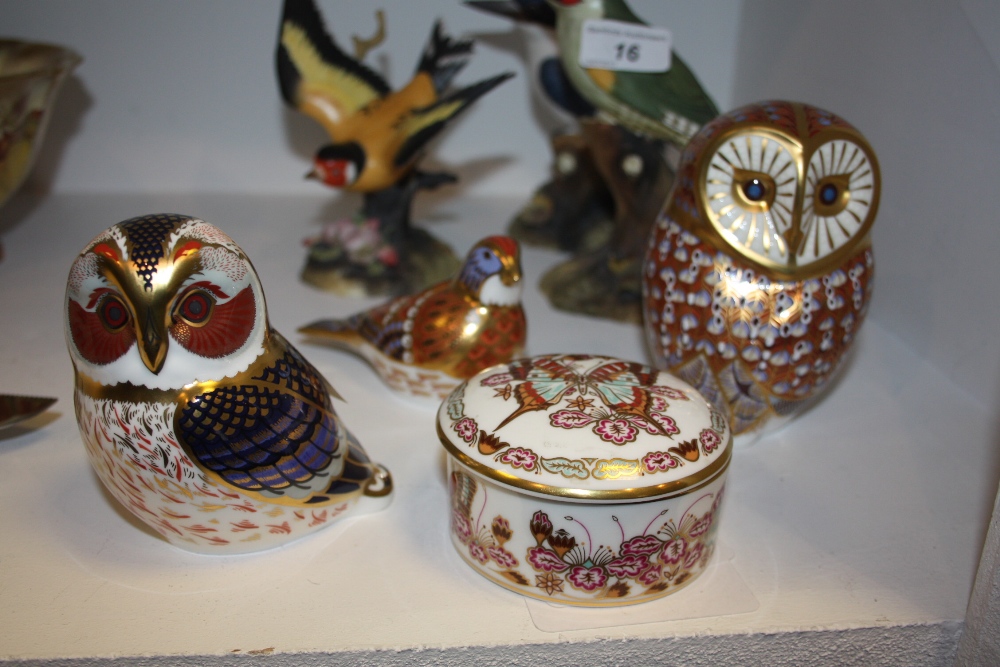 A Royal Crown Derby paperweight, Linnet; others Barn owl; Tawney owl ; a Royal Crown Derby Butterfly