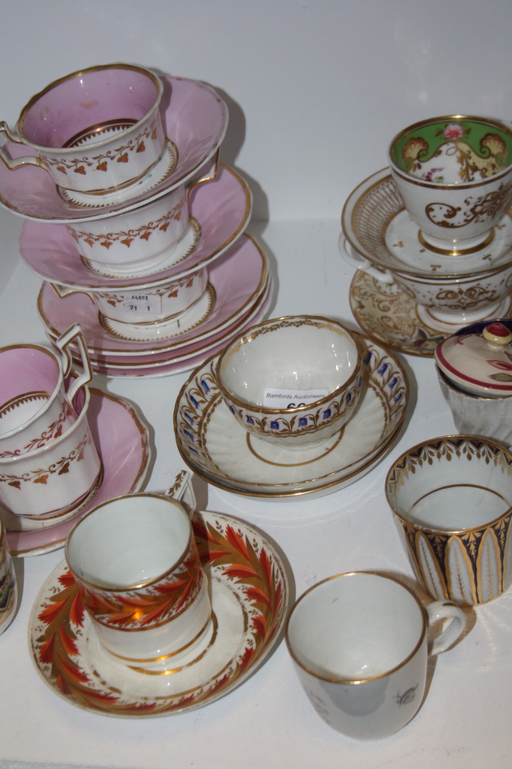 An English Porcelain part tea service; a Davenport teacup and saucer;  a Derby coffee cup;  a