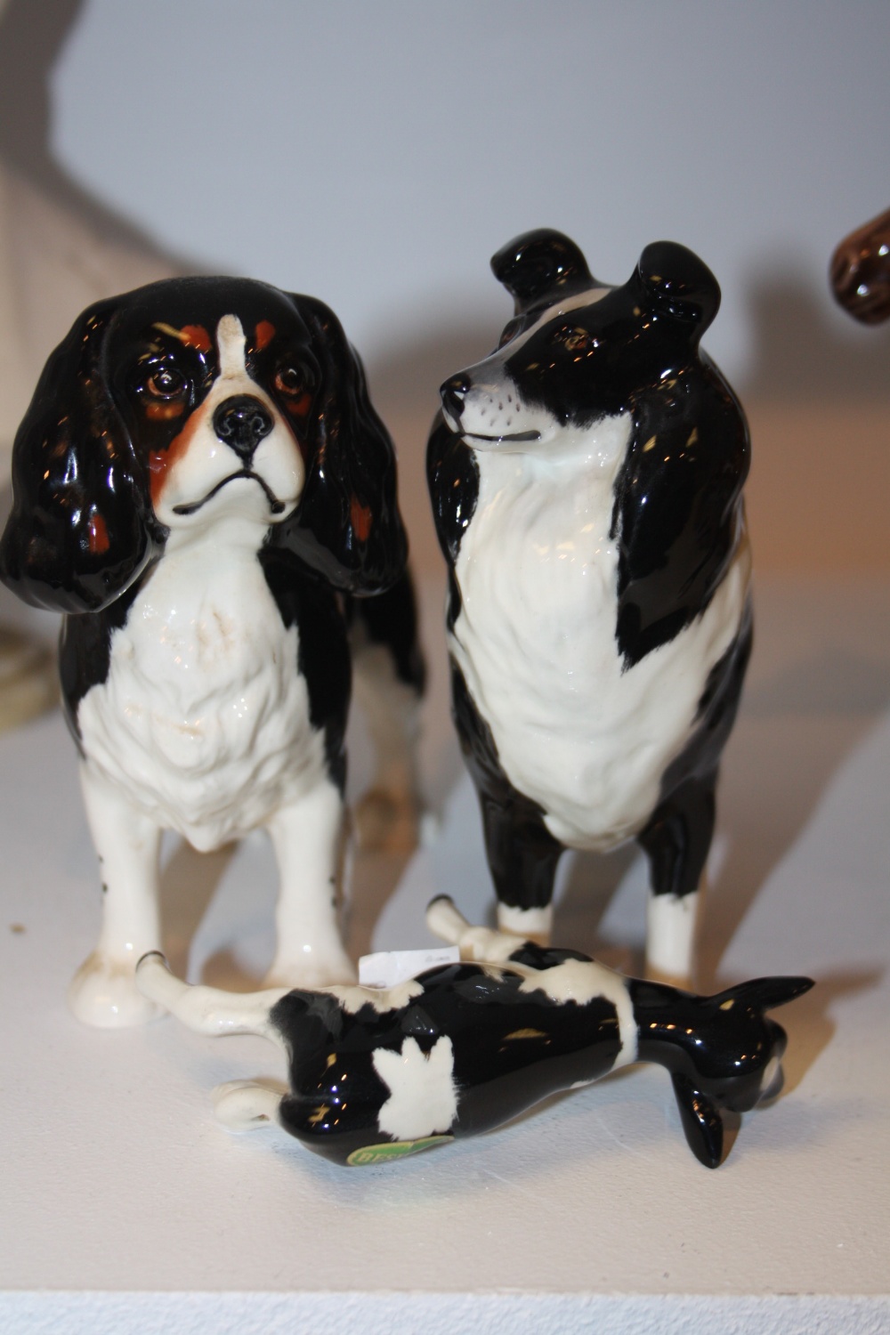 Beswick King Charles Spaniel, gloss, model no. 2107; A Beswick Border Collie, gloss, model no. 1791;