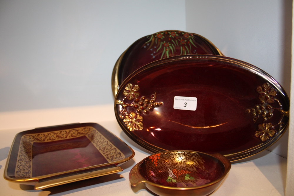 A Carlton ware rouge royale pattern dish; a conforming trinket dish; a rectangular tray; an oval