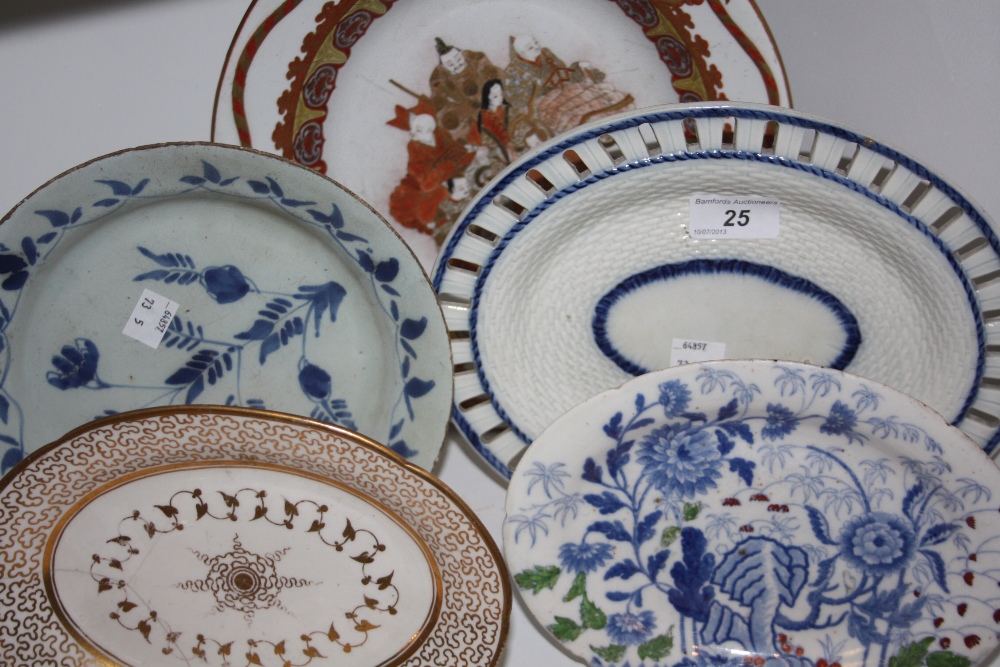 A Dutch Delft plate, in underglaze blue with stylised flower, c.1760;  a Pearlware basket work