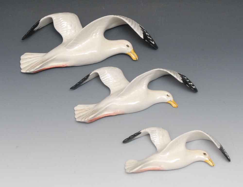 A set of three Beswick graduated flying seagulls, 28.5cm - 24.5cm, impressed 658-2/3/4