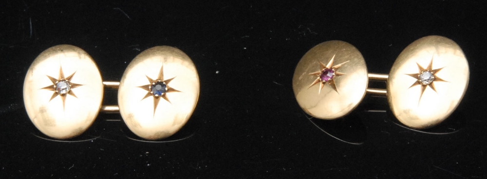 A pair of oval 18ct gold cufflinks, star set with ruby and diamond to centre, 8g