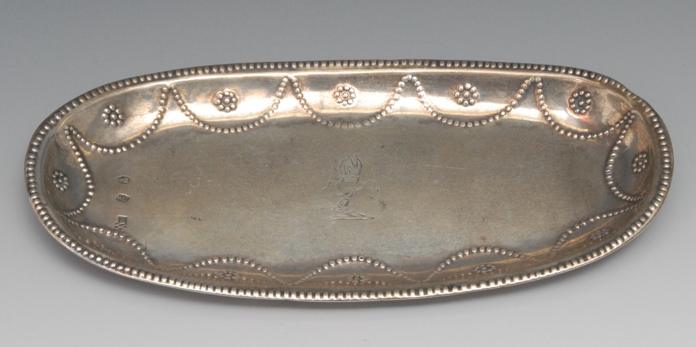 A George III Irish oval snuffer tray, engraved armorial with a bishops mitre, punched beaded rim,