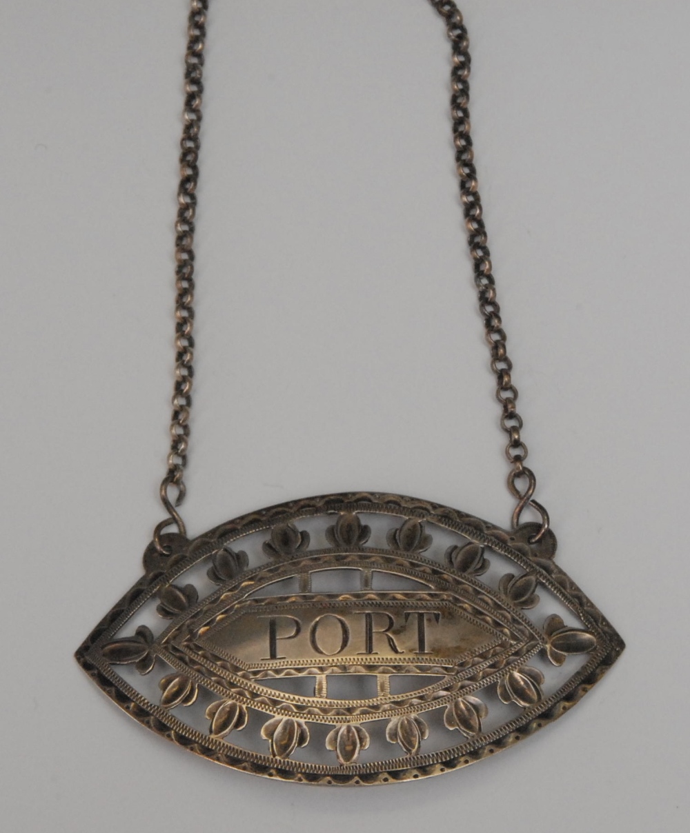 A George III Irish pierced silver `Port` decanter label, bright cut engraved, 6.5cm long, makers
