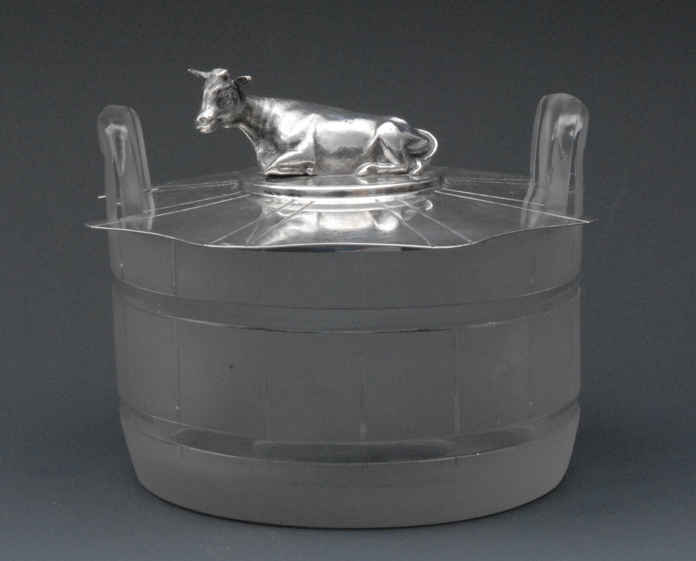A Victorian novelty butter dish, shaped cover surmounted by a finial cast as a recumbent dairy
