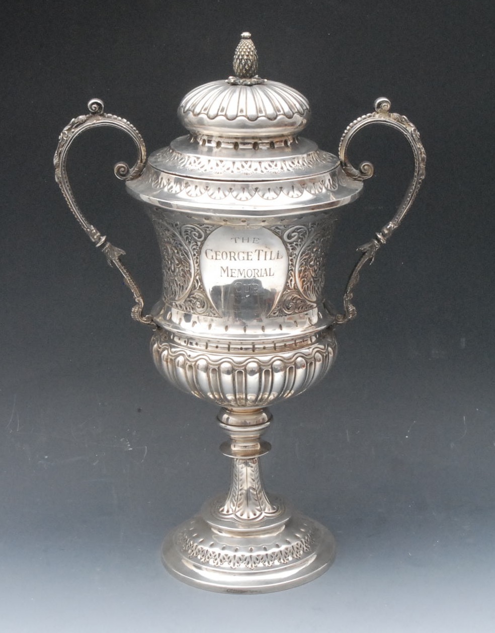 A Victorian campana pedestal trophy cup, The George Till Memorial Cup, fluted bun cover with pine