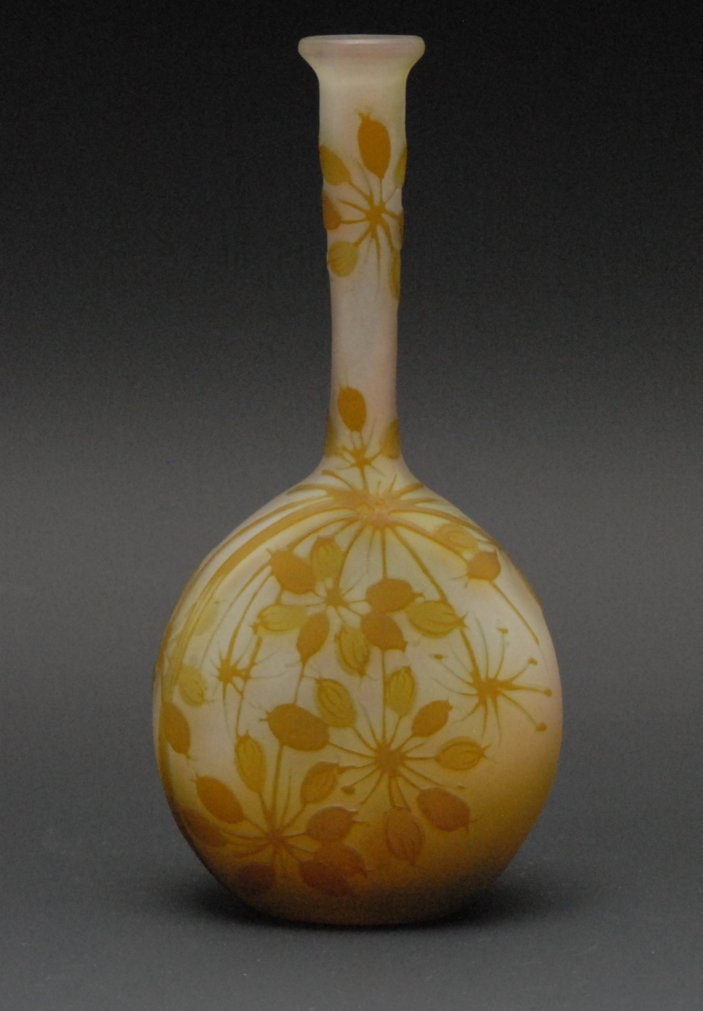 A Galle cameo glass flattened ovoid vase, overlaid in tones of green and yellow with Love in the