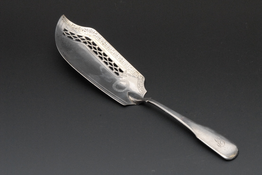 A George III Fiddle pattern fish slice, the shaped blade pierced and wriggle-work engraved with