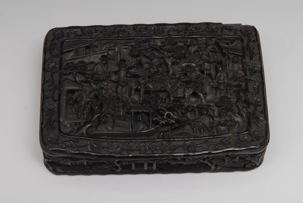 A Cantonese rectangular tortoiseshell snuff box, finely carved with figures on horseback, in gardens