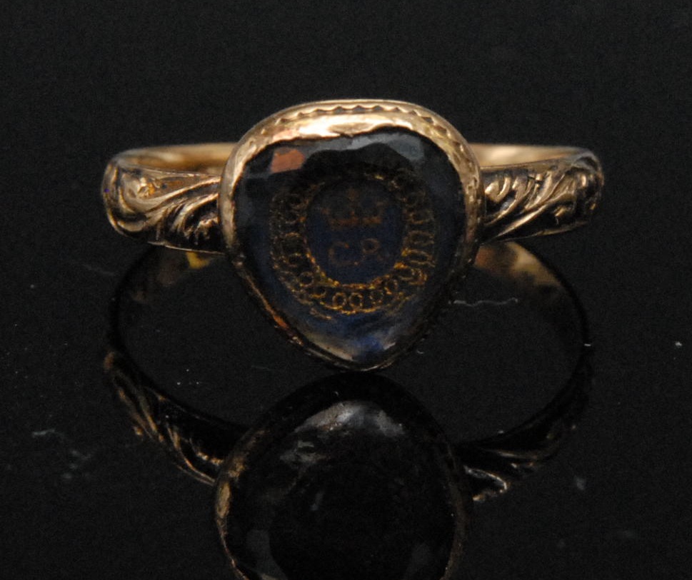 A rare 17th century diamond Charles II memorial ring, the heart shaped stone reverse carved and