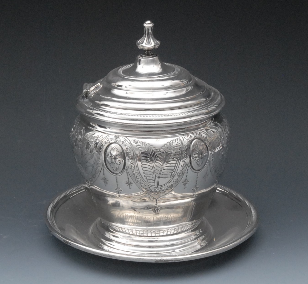 A Victorian E.P.B.M.  bowed biscuit box, lotus bud finial, hinged stepped cover, engraved and chased