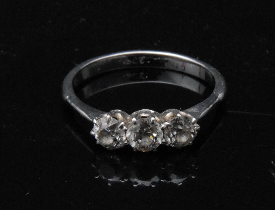 A diamond three stone lady`s ring, round brilliant cut stones, 18ct white gold shank