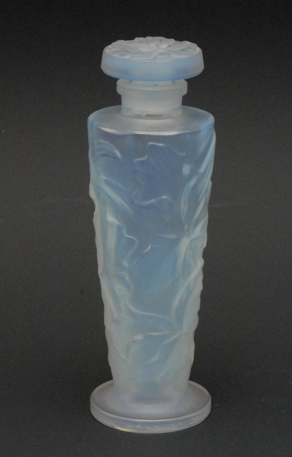 A Sabino Fire and Ice opalescent glass tapered cylindrical scent bottle and stopper, moulded in