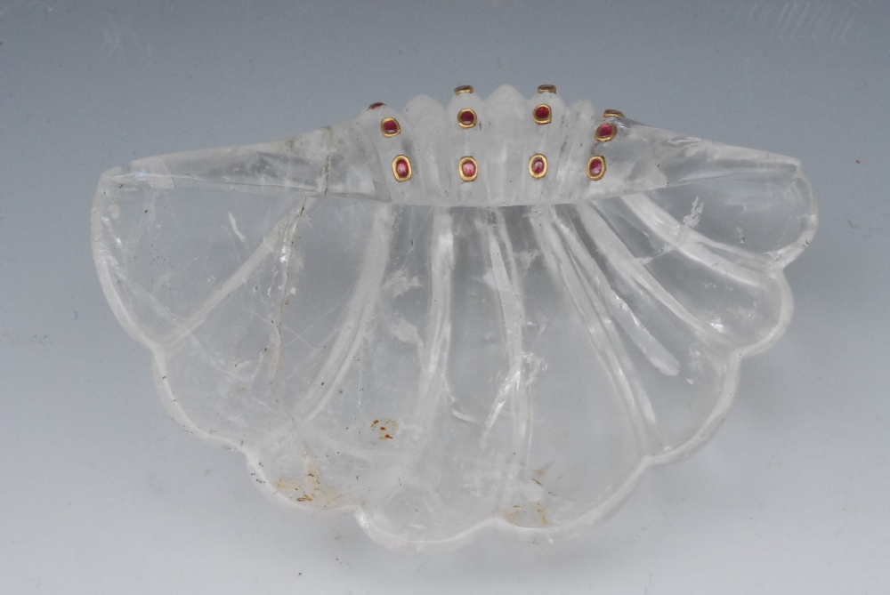 An Indian rock crystal dish, as a scallop shell, set with twelve rubies, 15cm wide