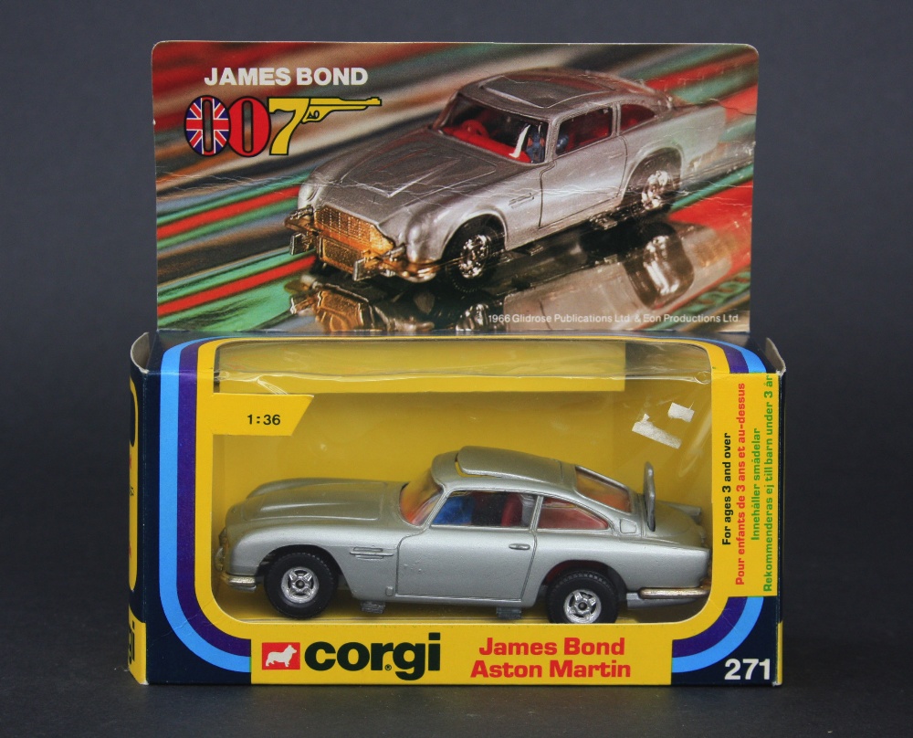 Corgi Toys 271 James Bond 007 Aston Martin, silver body with red interior, seated plastic figures to