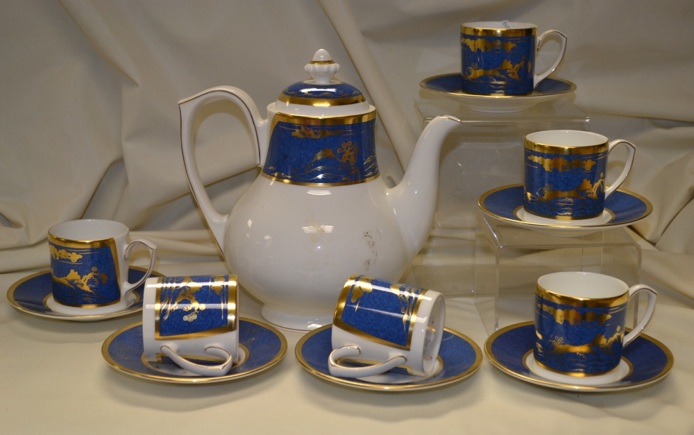 A Cartier coffee set with coffee pot and six coffee cans and saucers (seconds, without back stamp)