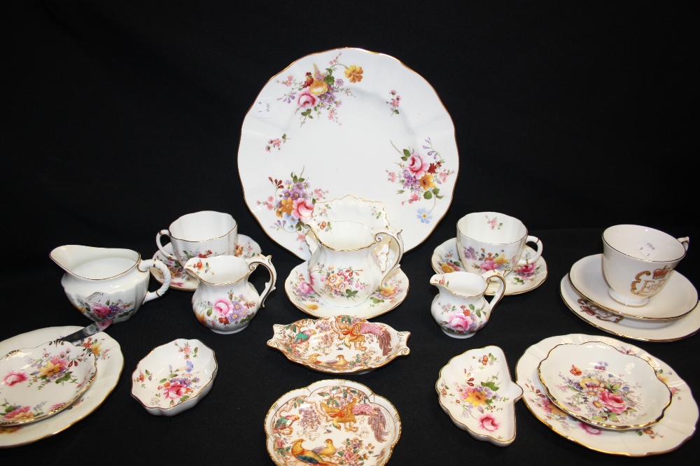 A Royal Crown Derby Posies pattern milk jug, printed marks; dinner plates, tea cups, trinket dishes;