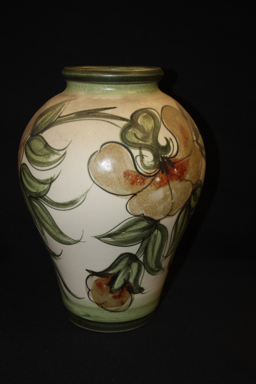 A large Langley ovoid vase, painted in tones of green and brown