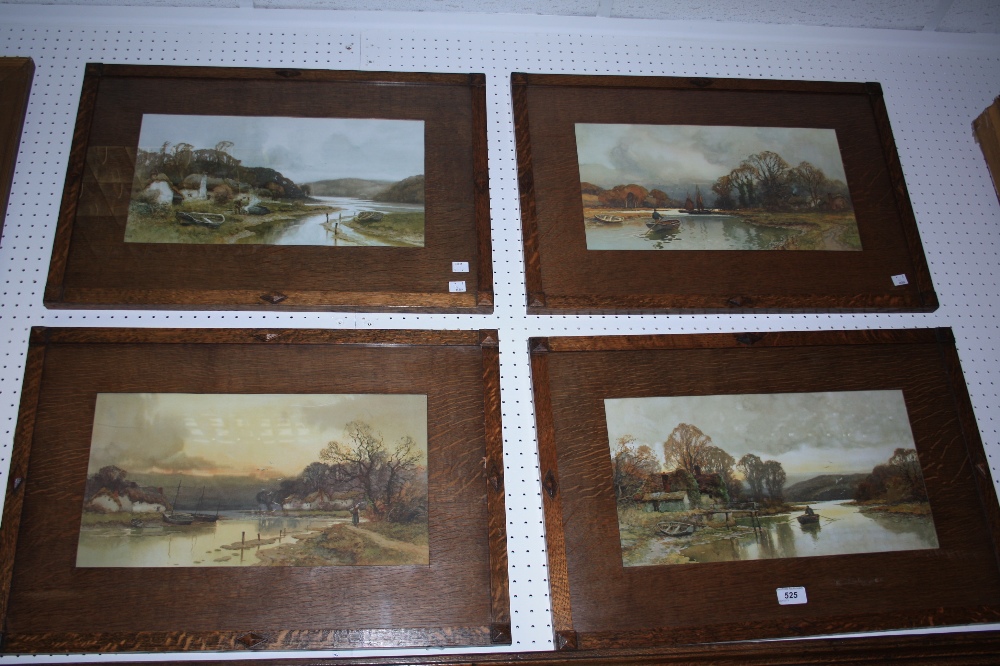 A set of four oak framed prints