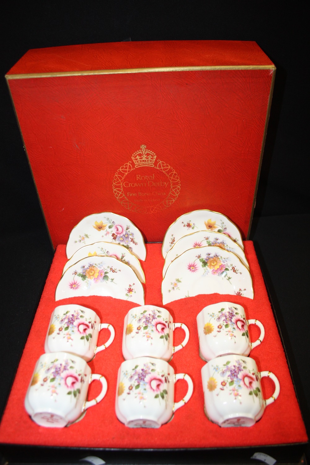 A Royal Crown Derby Posie pattern boxed coffee set