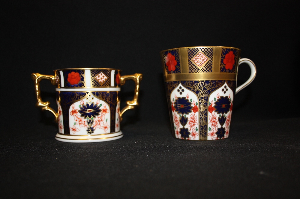 A Royal Crown Derby 1128 pattern mug; A Royal Crown Derby 1128 two handled mug (2nd) (2)