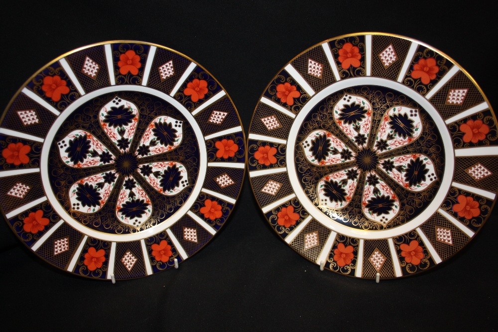 Two  Royal Crown Derby 1128 pattern dinner plates