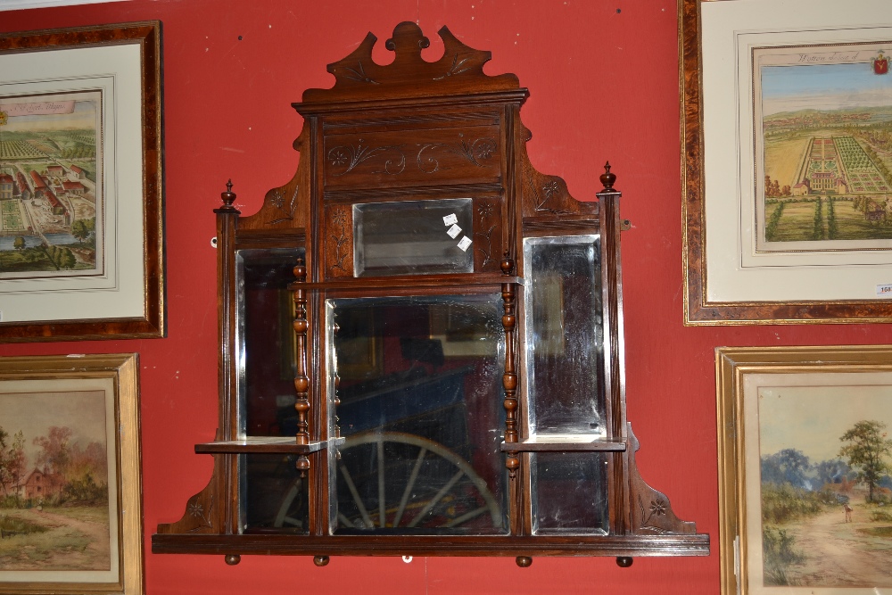 A Victorian mahogany inlaid over mantle mirror.