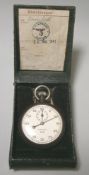 A Third Reich period Kriegsmarine stopwatch, the circular white enamel dial with arabic numerals,