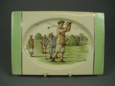 A Clarice Cliff Biarritz plate of `Victorian Golfers` pattern, printed factory mark and impressed