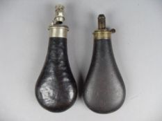 A `Sykes` patent leather and silver plated mounted powder flask and one other powder flask by