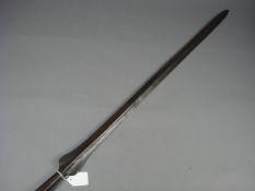 A Masai spear, with elongated double edged leaf type blade, short wooden shaft and iron base.