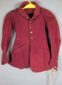 A late Victorian child`s hunting coat with brass buttons, marked `extra rich quality` to reverse