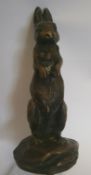 An Alvis bronze car mascot in the form of a standing hare, 15cm high.