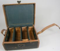 A late 19th /early 20th century leather bound four division cartridge case, 34cm wide.