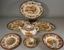 A Worcester Palissy Ware game series dinner and tea service,decorated with polychrome transfer print