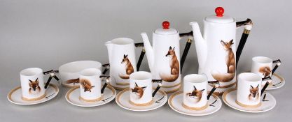 A Royal Doulton tea service of `Renyard the Fox pattern` H4927, with `riding crop` handles and fox