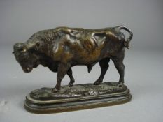 After Isidore Bonheur, a late 19th century bronze study of a bull standing on an oval naturalistic