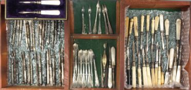 A collection of Victorian and later nut picks, to include ivory and bone handled examples and