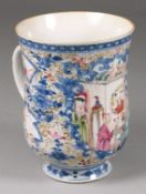A Chinese famille rose export mug of bell shape with loop handle, painted with figures on a