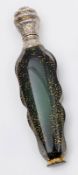 A Victorian mounted green glass and gilt decorated scent bottle, unmarked. of tapered lozenge
