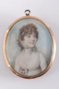 English school circa 1780 Miniature portrait of a lady, head and shoulders with long dark curling