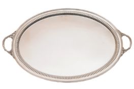 An Edward VII silver oval tea tray, maker William Hutton & Sons Ltd, London, 1909, of oval