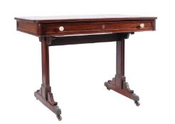 An early 19th Century mahogany library table, the rectangular top with rounded corners and a