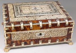 A 19th Century Indian ivory and tortoiseshell sewing box, of rectangular outline with applied