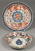 A Chinese wucai saucer dish and one other the first painted in the centre with a shou roundel and