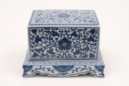 A Chinese porcelain incense box and covers of rectangular form with smaller box and stand with inner
