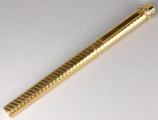 Cartier. A ‘les must de Cartier’ gold plated ball-point pen in case.