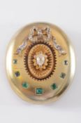 A 19th century gold, emerald and diamond mounted oval brooch with central pear-shaped old