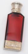 A Victorian silver and ruby glass combined scent bottle and vinaigrette, maker F. Marsden,